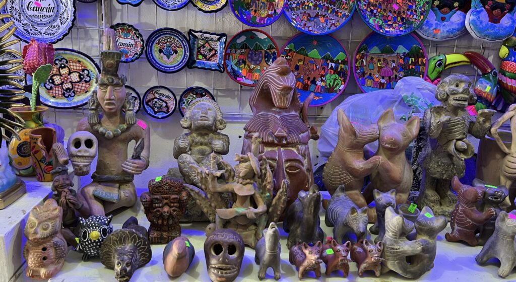 ancient Maya sculptures and decorative Mayan art at Mercado 23 Cancun