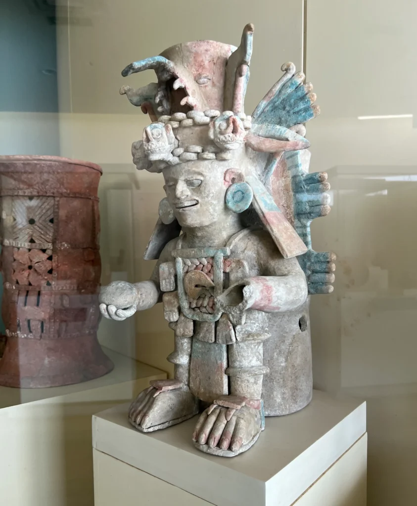 Ancient Maya ceramic figure displayed at the Maya Museum in Cancun.